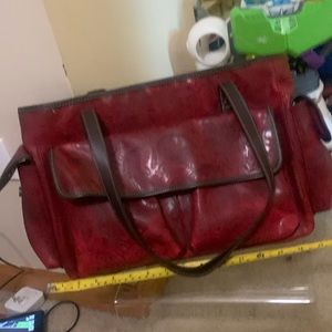 Relic brand red purse have multiple pockets